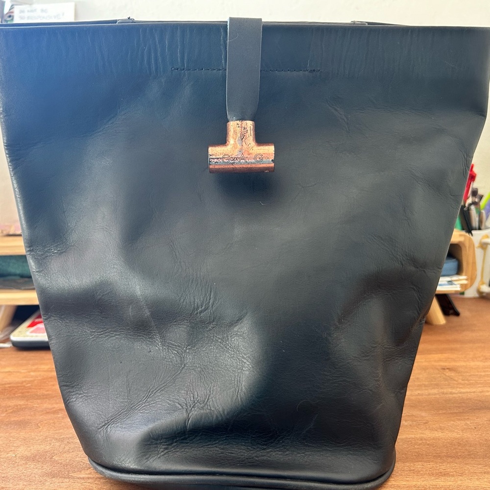 Black leather bucket bag from GAG Mexico